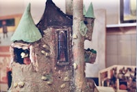 a model of a castle with a green roof