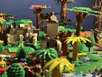 a lego model of a jungle with trees and plants