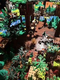 a lego model of a forest with trees and bushes